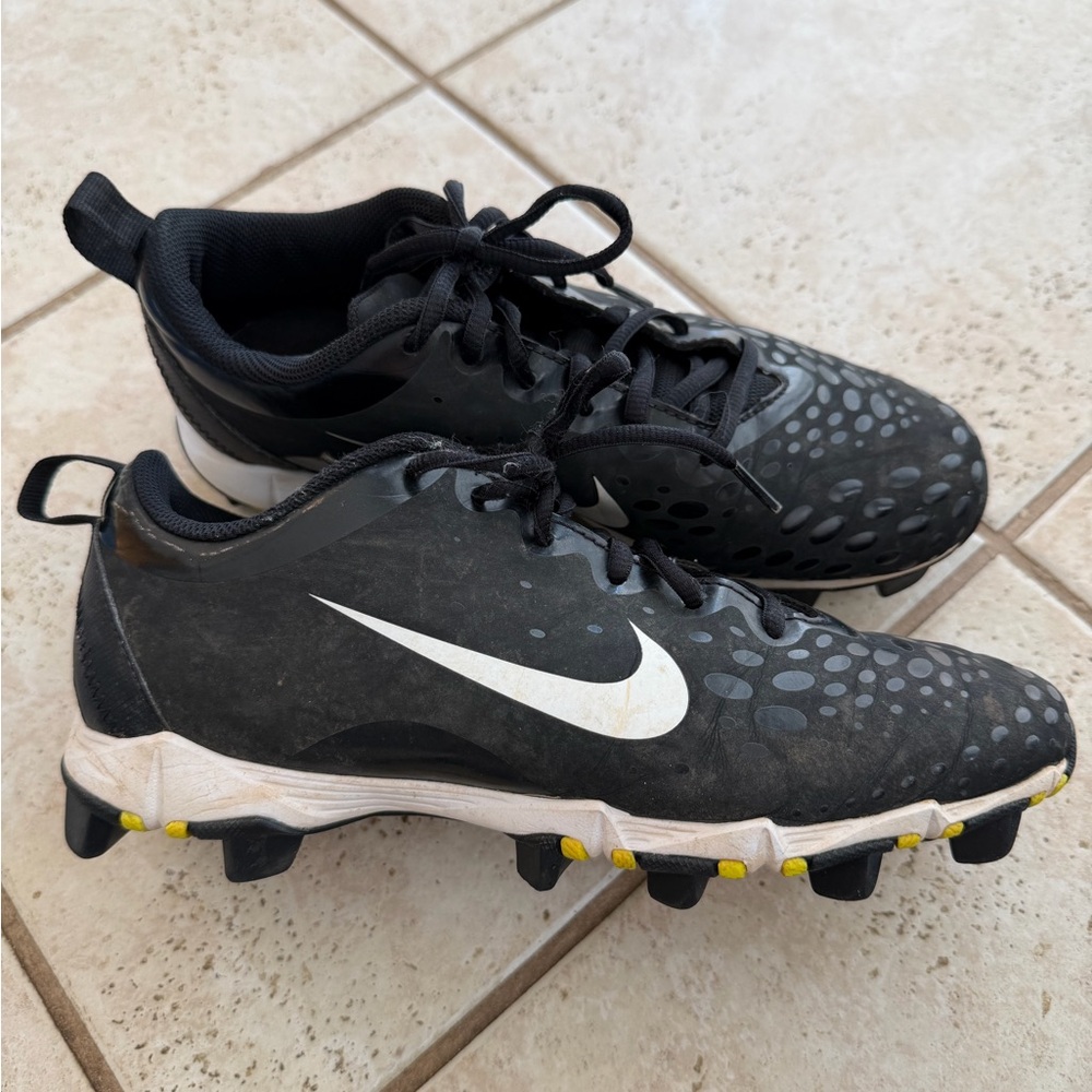 Nike Kids Black and White Cleats with Yellow Accents